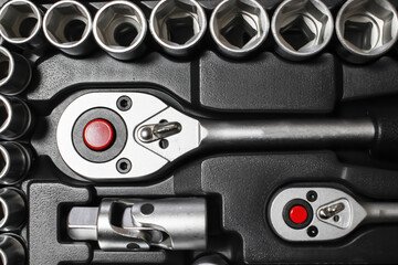 close-up of a set of metal tools in a box