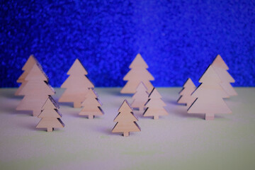 Interpreting in the shot, macro tree in the middle of a snowy forest with more in the background
