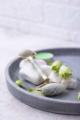 Green jade facial roller for skincare