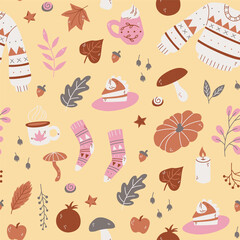 Seamless pattern of autumn elements. Cute vector background wool sweater, tea mug, socks and leafs.
