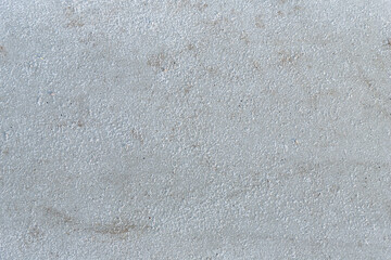 Concrete surface covered with ice crystals. Frozen concrete texture.