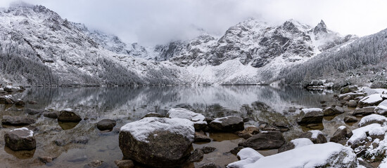 Panoramic view of scenic idyllic winter landscape in the poland tatras at famous mountain lake Eye of the Sea or Morskie Oko, Tatras Mountain poland © Martin