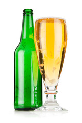Large full beer glass with green empty bottle, isolated on white.