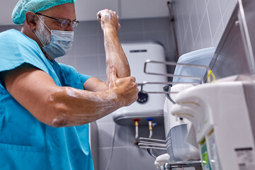 the doctor's hands must be clean, man is removing dirt during coronavirus, covid-10 epidemic. hygiene concept
