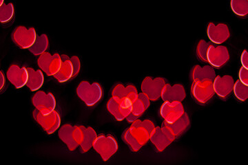 Red Heart Bokeh on black background. Valentine concept