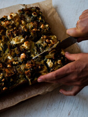 Rustic farmhouse spinach quiche in natural light