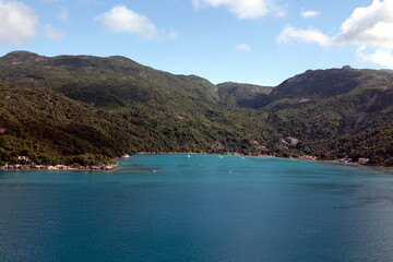 The beauty of the port of Labadee in Haiti's iland, clear vision with high mountains with tropical forest present trees and special animals.Dense and evergreen vegetation.