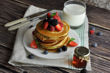 Pancakes with berries close-up.
