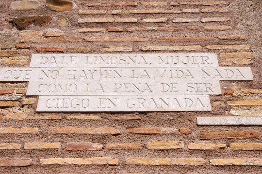 Granada (Spain). Inscription in the Jardin de los Adarves inside the Alcazar of the Alhambra in Granada