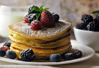 Pancakes with powdered sugar.