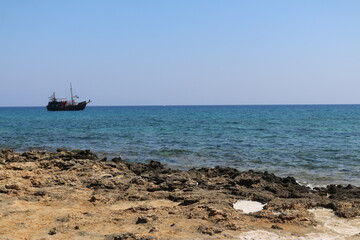 Fototapeta premium black ship on the Mediterranean sea Cyprus