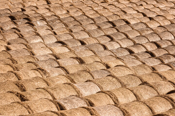 A lot of stacks of hay