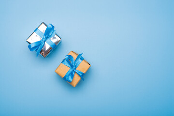 Fototapeta na wymiar blue gift box with ribbon