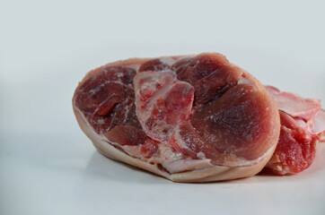 pieces of raw pork steaks, for cooking,on white background. Concept of food preparation. Separated on white background.