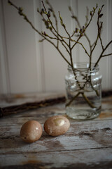 Easter eggs colored with black tea and gold pen