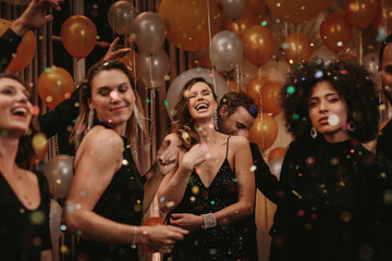  Group of friends having a great time at a party