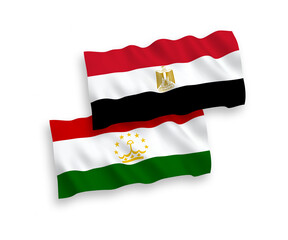 National vector fabric wave flags of Tajikistan and Egypt isolated on white background. 1 to 2 proportion.