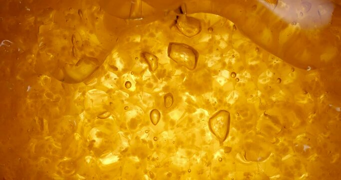 honey flows down the honeycomb, natural honeycomb with honey