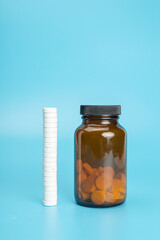 pills spilling out of bottle