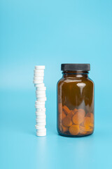 pills spilling out of bottle