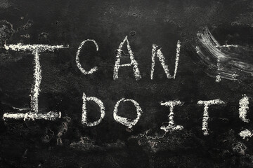 i can do it - chalk lettering on black background close up i can concept