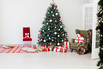 Beautiful Christmas decor of residential white room with stucco