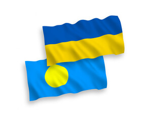 National vector fabric wave flags of Palau and Ukraine isolated on white background. 1 to 2 proportion.