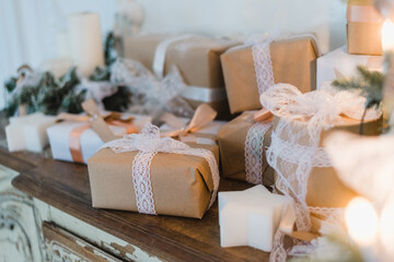 Classy Christmas hand made gifts box presents with brown bows. Selective focus