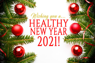 Christmas decorations with message "Wishing you a... Healthy New Year 2021!"