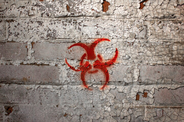 image of toxic sign on a brick wall