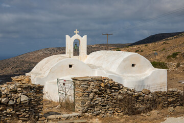 Traditional white chapel , Ios island, Greece.