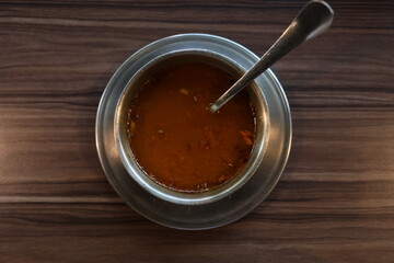 South Indian Dish Dosa Rasam served on Table with Banana Leaf on Plate