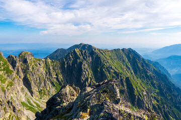 Fototapeta na wymiar Majestic mountain scenery in High Tatras Mountains poland. Cloudy mid day. eagles trail