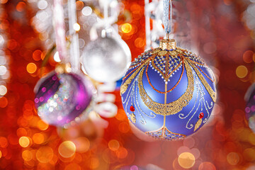 Decorated and illuminated Christmas tree, close-up