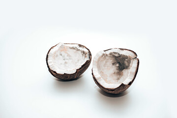 Coconut spoiled with mold isolated on white background, flat lay