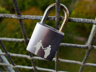 Love Lock padlock on on a bridge with blurred background