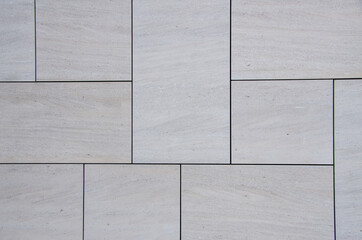 bright smooth modern sandstone facade with an irregular pattern
