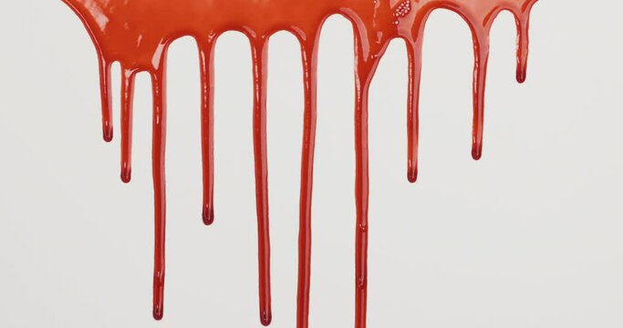 Red blood liquid dripping down on white background.