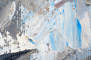 Macro. Abstract art. Expressive embossed pasty oil paints and reliefs. Colors: white, blue.