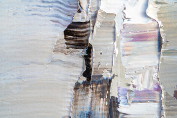 Macro. Abstract art. Expressive embossed pasty oil paints and reliefs. Colors: white, black.