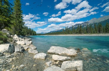 Turquoise waters of Kootenay River near Radium Hot Springs BC, Canada on a hot summer day.
