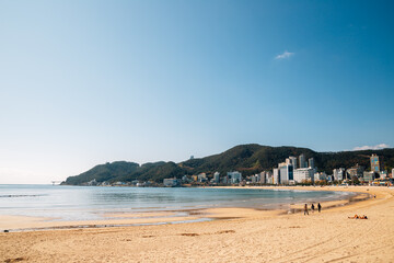 Fototapeta na wymiar Songjeong beach with modern buildings in Busan, Korea