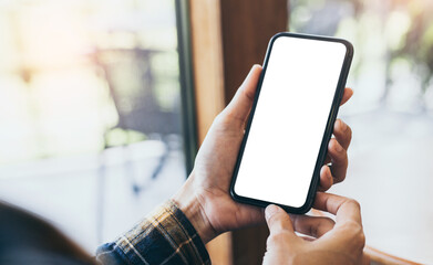 cell phone blank white screen mockup.woman hand holding texting using mobile at cafe.background empty space for advertise.work people contact marketing business,technology