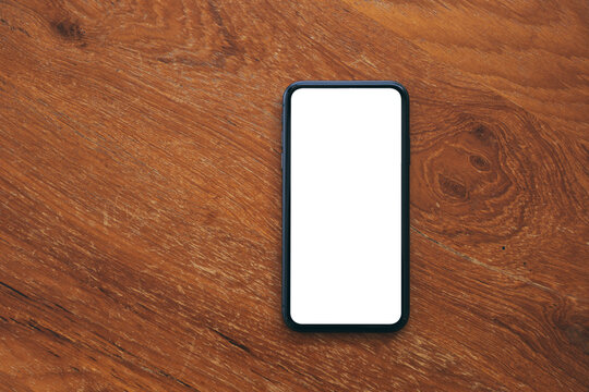 cell phone blank white screen mockup.mobile on desk at office.background empty space for advertise.work people contact marketing business,technology