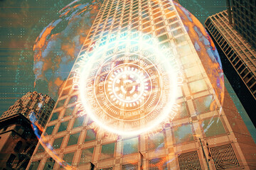 Double exposure of technology theme hologram and cityscape background. Concept of Hightech.