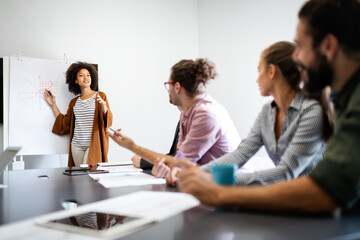 Fototapeta premium Group of business people collaborating on project in office