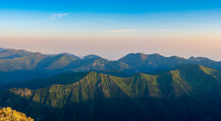Obraz premium Scenic image of Fairytale mountains during sunrise. The sunrise over a mountain in park High Tatras. Slovakia, Europe. Wonderful Autumn landscape. Picturesque view of nature Amazing natural Background