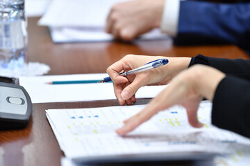 business, pen, hand, document, paper, writing, office, contract, people, closeup, businessman, meeting, human, hands, close-up, finance, work, paperwork, financial, table, agreement, person, report, w