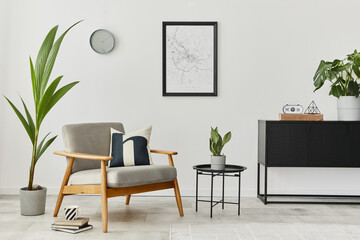 Modern retro concept of home interior with design grey armchair, coffee table, commode, plants,...