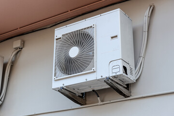 Outdoor Air conditioning unit mounted on wall
